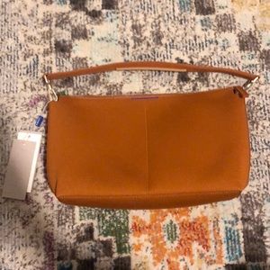Rothy’s daily crossbody in amber brown